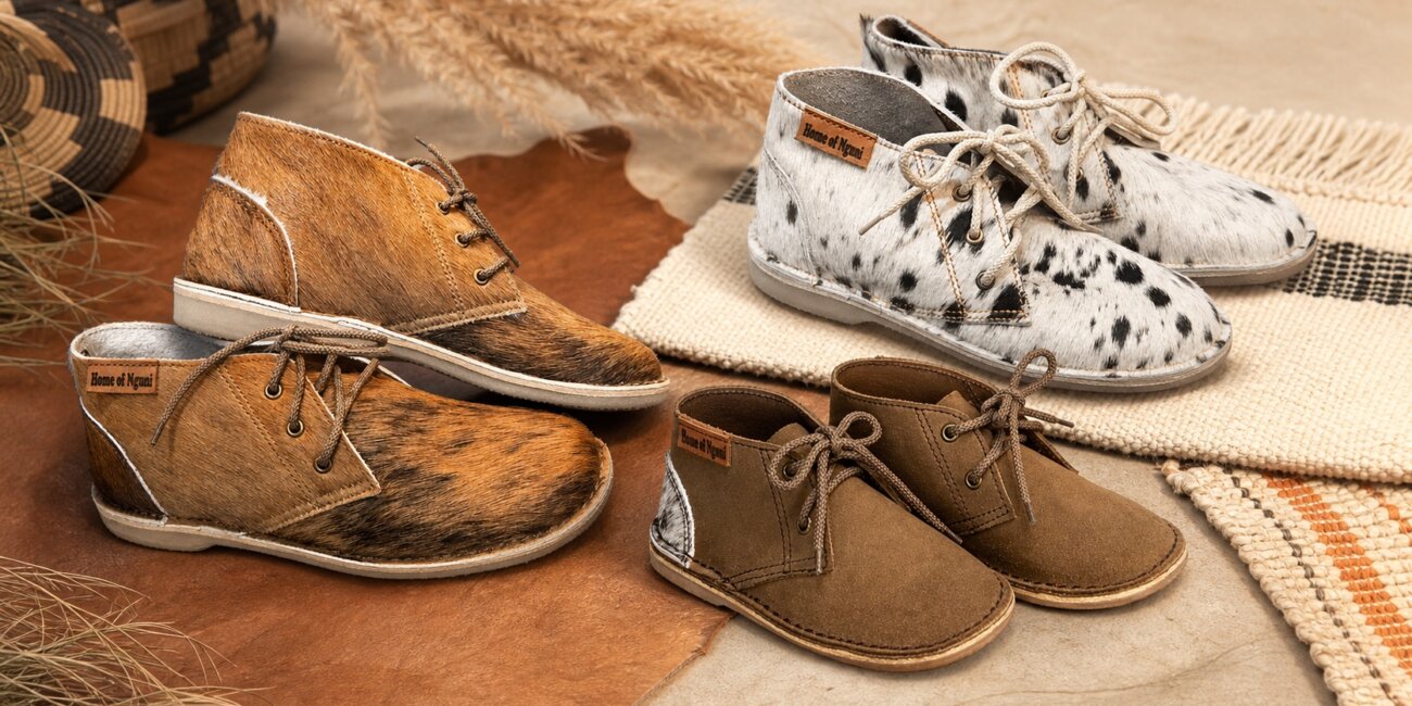 Home of Nguni men’s, women’s and children’s vellies arranged as a family footwear collection